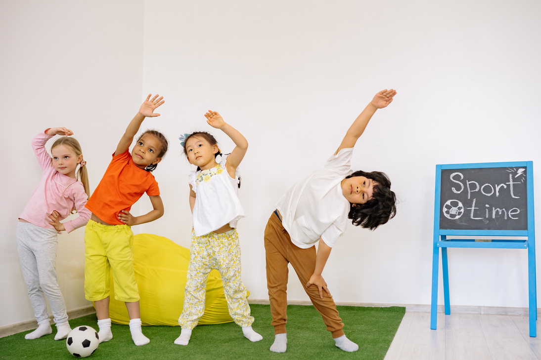 Active Kids Doing Bending Exercise